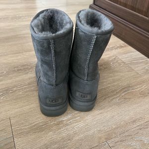 Grey uggs that have been barely worn. They are mid calf and size 8